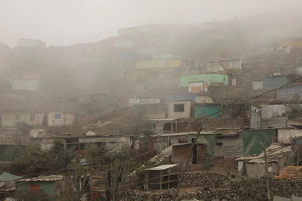 A view of Nueva Union shantytown during a foggy day in Villa Maria del Triunfo district