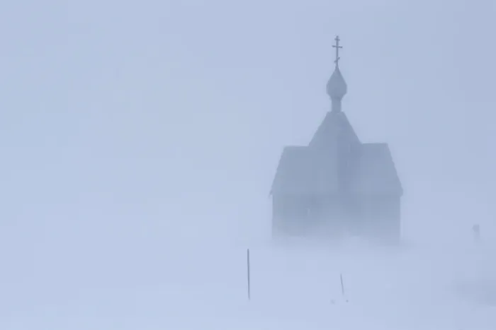 Framed Print : A view shows a church during a heavy snowfall in a settlement on the Pechora Sea island Framed Print : A view shows a church during a heavy snowfall in a settlement on the Pechora Sea island