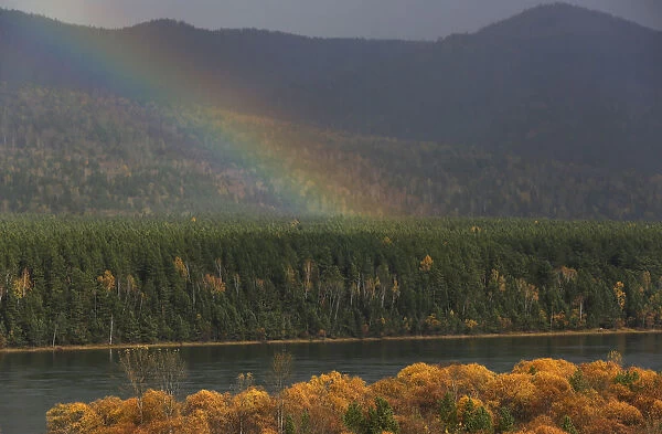 A view shows a rainbow above the bank of the Yenisei River outside Krasnoyarsk