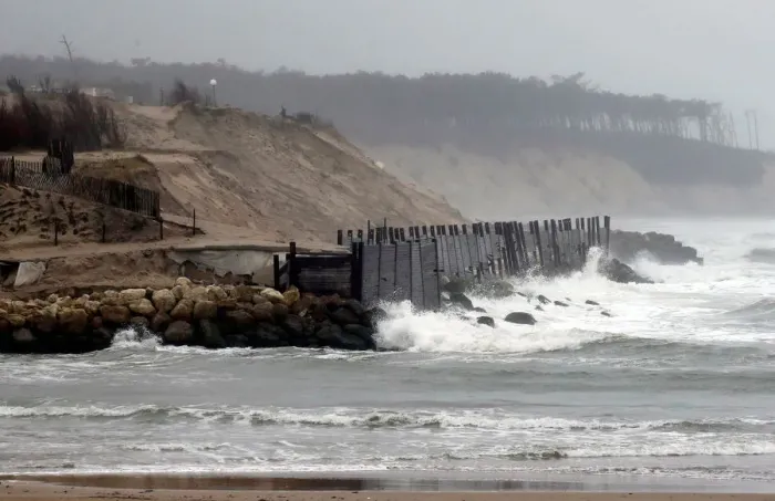 Framed Print : A view shows sea walls on the beach front to protect damaged sand dunes due to Framed Print : A view shows sea walls on the beach front to protect damaged sand dunes due to
