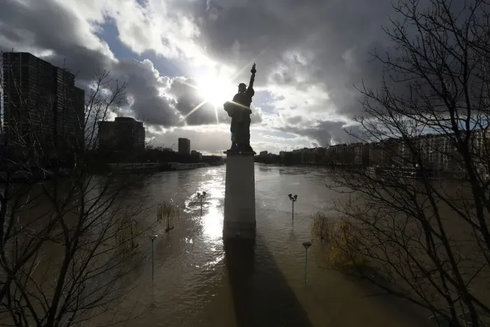 Framed Print : A view shows the Statue of Liberty replica and flooded banks of the River Seine after