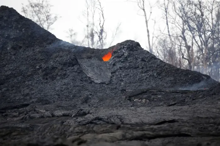 Framed Print : A volcanic fissure glows red near Nohea Street, in the Leilani Estates, near Pahoa