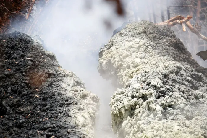 Framed Print : Volcanic gases rise from a fissure in the Leilani Estates subdivision during ongoing Framed Print : Volcanic gases rise from a fissure in the Leilani Estates subdivision during ongoing