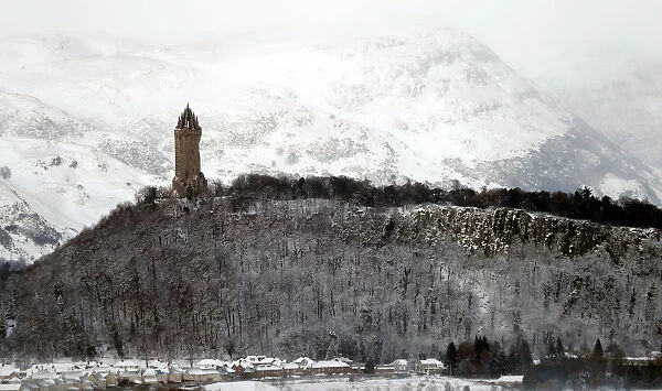 The Wallace Monument can be seen in the snow near Sterling, Scotland