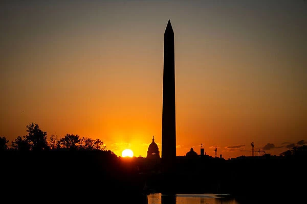 The Washington Monument is seen on the National Mall before the iconic landmark is set to