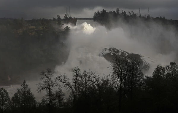 Water is released from the Lake Oroville Dam after an evacuation order was lifted for