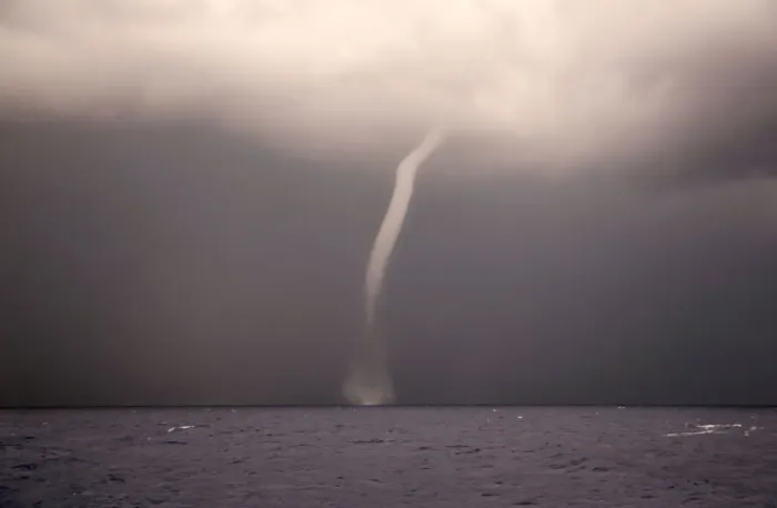 Framed Print : A waterspout is seen from the German NGO Sea-Eye migrant rescue ship Alan Kurdi as it