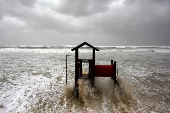 Framed Print : Waves break on a slide on the shore of the Mediterranean in Tel Aviv