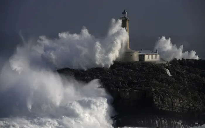 Framed Print : Waves crash on the lighthouse of La Isla del Mouro in the port town of Santander in Framed Print : Waves crash on the lighthouse of La Isla del Mouro in the port town of Santander in