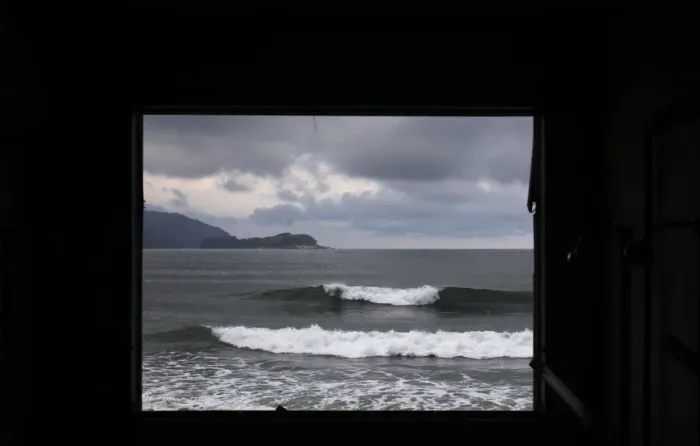 Framed Print : Waves in the sea are seen through a window of a building destroyed by March 11s magnitude 9 Framed Print : Waves in the sea are seen through a window of a building destroyed by March 11s magnitude 9
