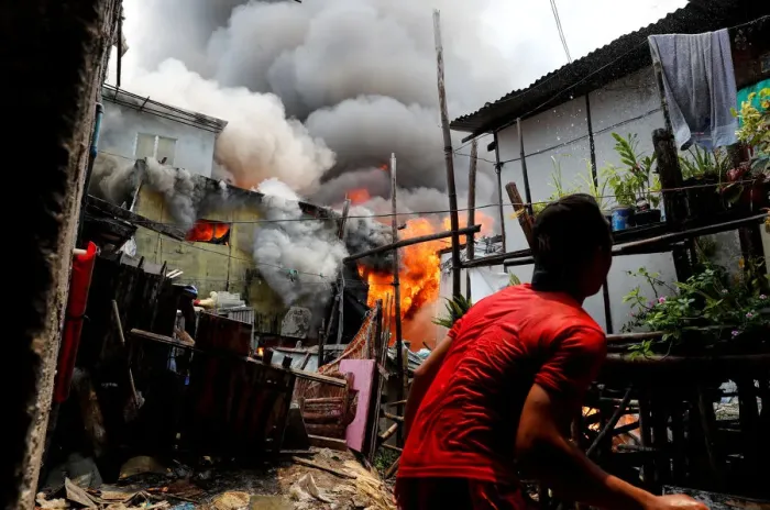 Framed Print : The Wider Image: Manilas slums an endless battle for firefighters Framed Print : The Wider Image: Manilas slums an endless battle for firefighters