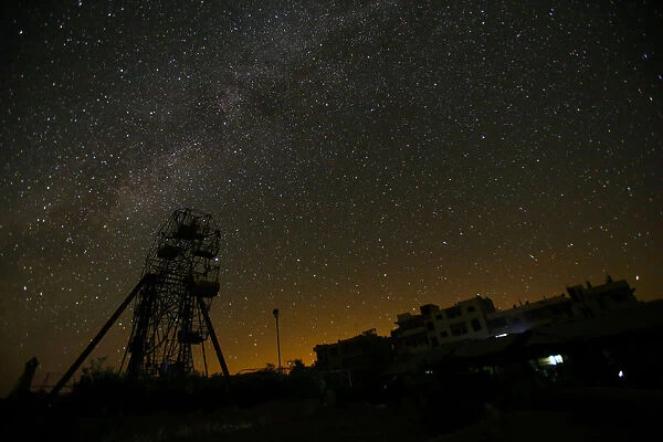 The Wider Image: Starry nights and empty streets in Syria