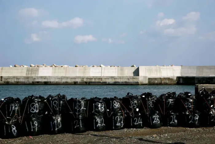 Framed Print : The Wider Image: After tsunami, some Japanese are feeling walled-in Framed Print : The Wider Image: After tsunami, some Japanese are feeling walled-in