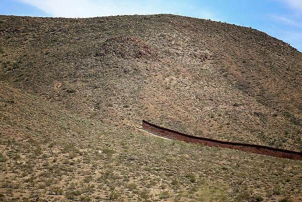 The Wider Image: Along the U. S. - Mexico border fence
