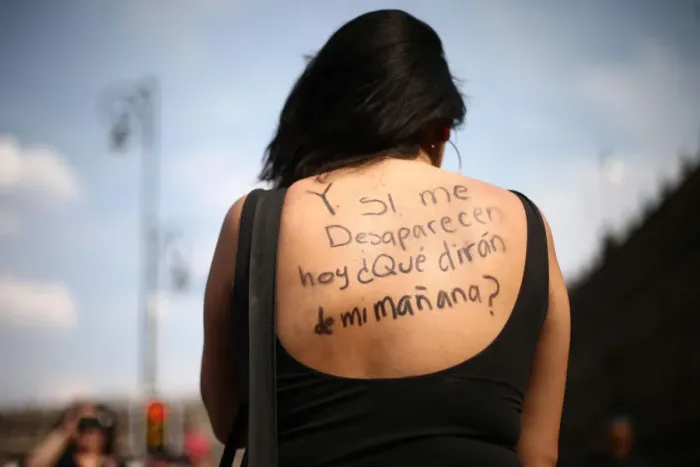 Framed Print : A woman takes part in a demonstration demanding justice for the female victims of Framed Print : A woman takes part in a demonstration demanding justice for the female victims of
