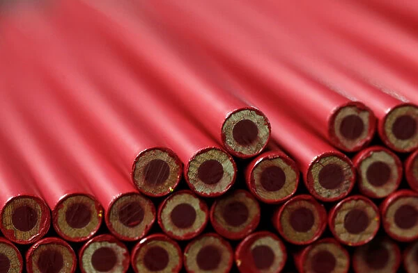 Wood-cased pencils are pictured during their production at Faber-Castell manufacturer in