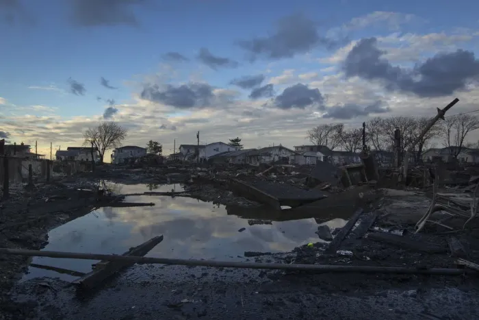 Framed Print : The wreckage of homes devastated by fire and the effects of Hurricane Sandy are seen in Framed Print : The wreckage of homes devastated by fire and the effects of Hurricane Sandy are seen in