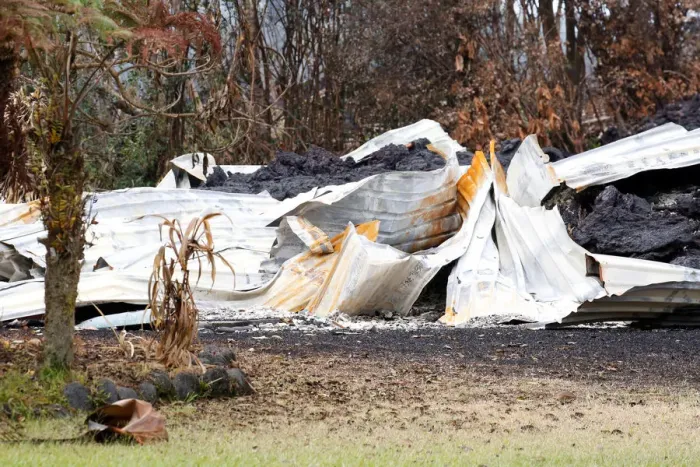 Framed Print : Wreckage of a structure is evident in a lava flow in the Leilani Estates subdivision Framed Print : Wreckage of a structure is evident in a lava flow in the Leilani Estates subdivision
