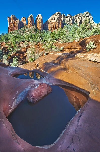 USA, Arizona, Sedona. Water pools in rock