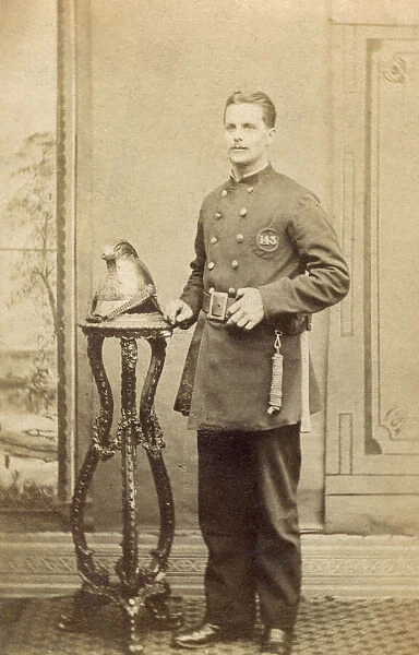 Young fireman in studio photograph