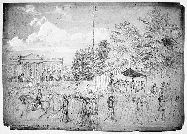 ABRAHAM LINCOLN (1809-1865). 16th President of the United States. President Lincoln and General Winfield Scott observing a procession of Union soldiers down Pennsylvania Avenue. Drawing by Alfred R. Waud, 1861