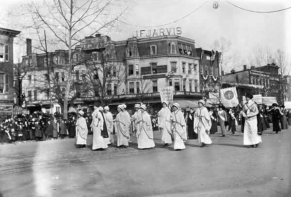 SUFFRAGE PARADE, 1913. Women of the National Woman Suffrage Assocation at the