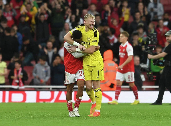 Arsenal's Nelson and Ramsdale Celebrate Victory Over Nottingham Forest in 2022-23 Premier League