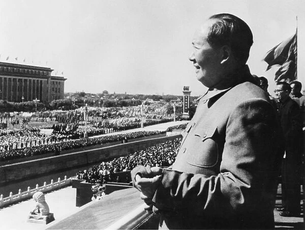Chairman mao zedong on the rostrum in tienanmen square viewing a parade in honor of the 14th anniversary of the founding of the peoples republic of china, beijing, china, october 1963