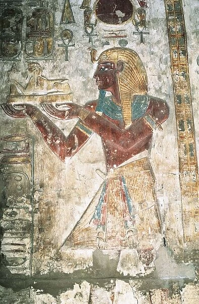 Egypt, Luxor, Karnak Temple complex, Temple of Khonsu, painted relief of pharaoh