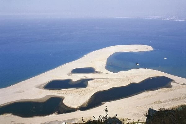 Italy, Sicily Region, Province of Messina, Tindari, Aerial view of Laghetti di Marinello Natural Reserve
