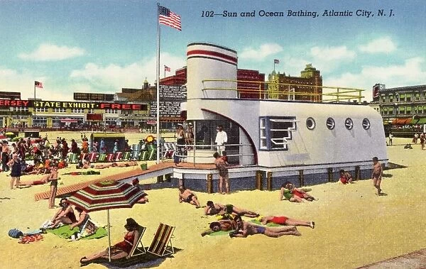 Sunbathing at Beach. ca. 1943, Atlantic City, New Jersey, USA, 102-Sun and Ocean Bathing, Atlantic City, N. J. Surf bathing, the finest in the world, on a gradually sloping, safe, golden-sanded beach, is enjoyed by Atlantic Citys millions from May to October. Several splendid indoor salt water pools provide year- round bathing