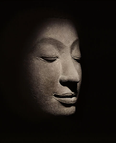 Buddha head from the early Ayutthaya Period (stone)