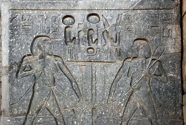 Egyptian antiquite: detail of the base of the statue of Pharaoh Ramses II