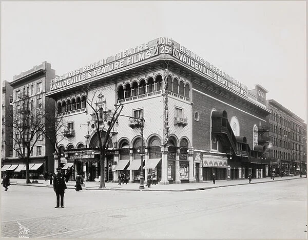 A huge theater with an elaborate facade, complete with Moorish arches and balconies