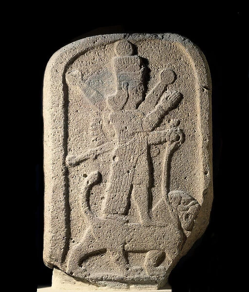Stele representing the goddess Ishtar of Arbeles holding a lion