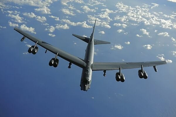 A U. S. Air Force B-52 Stratofortress flies a mission over the Pacific Ocean