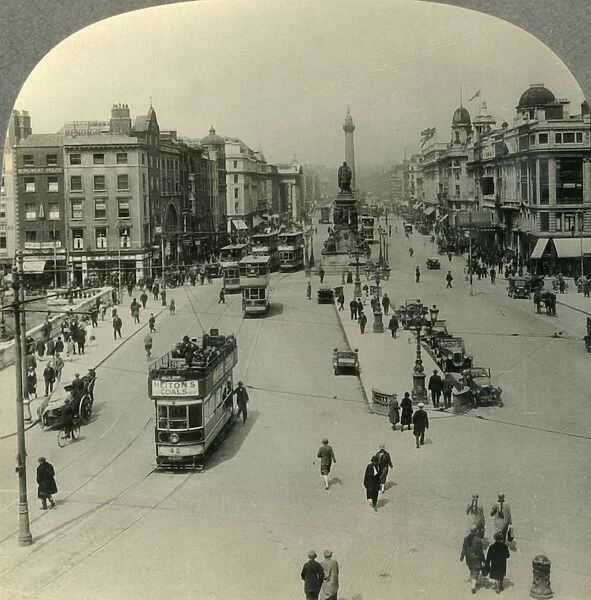 The O Connell Monument and the Nelson Pillar, O Connell Street, Dublin, Ireland, c1930s