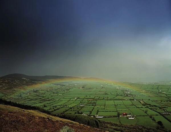 Rainbow Over Fields In Slieve Gullion, Co Armagh, Ireland