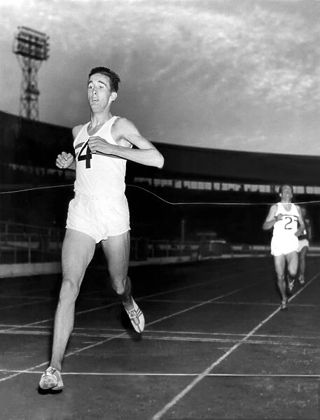 Britain v Russia Athletic Meeting: White City: London. Gordon Pirie finishes in grand