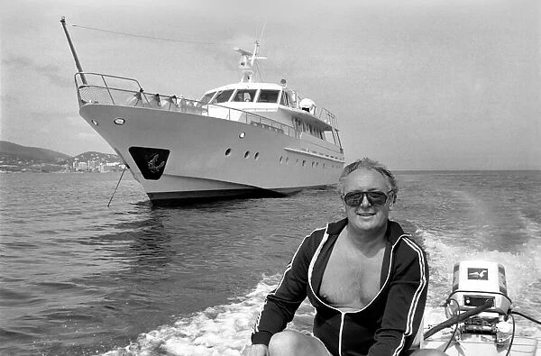 Freddie Laker: Entrepreneur with his motor cruiser in Majorca. July 1981 81-03733a-011