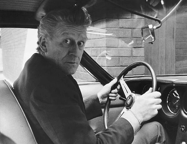 Jon Pertwee actor seated inside one of the £6, 500 12 cylinder 170mph lamborghinis