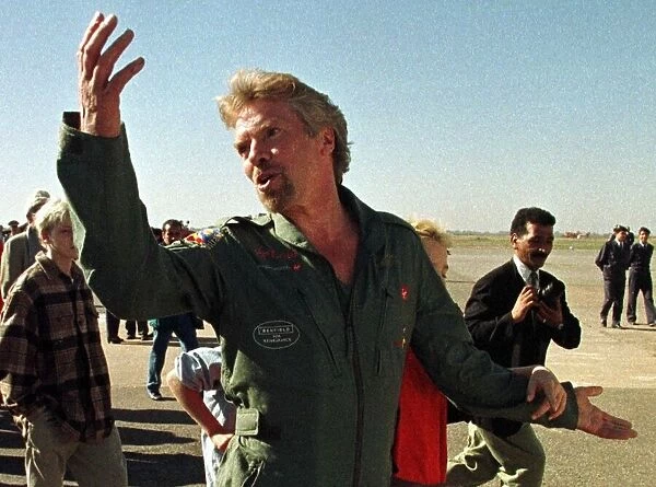 Richard Branson British tycoon gestures as he arrives at a Moroccan airbase after