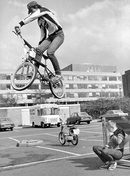 Stunt rider Andrew Bell of Team conway BMX team leaps over fellow club member Mark Taylor