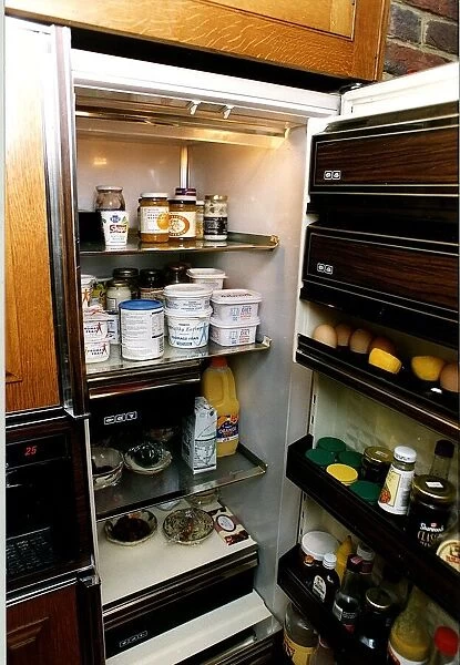 Uri Geller TV Personality Psychic and Spoon Benders fridge at home full of yoghurt