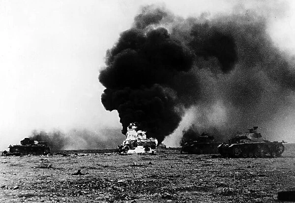 WW2 1941 Enemy tanks ablaze after their capture by South African troops
