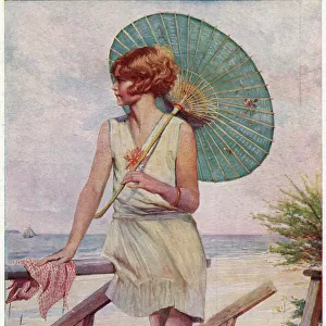 1920s woman relaxing by the sea