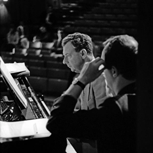 Benjamin Britten working on his score