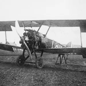 Captured Sopwith Camel biplane on an airfield, WW1