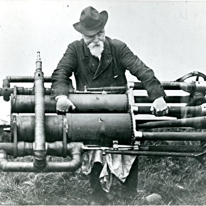 Sir Hiram Maxim in 1894 with one of the two steam engine?