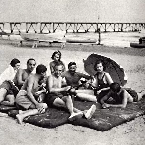 Society basking on the Lido sands